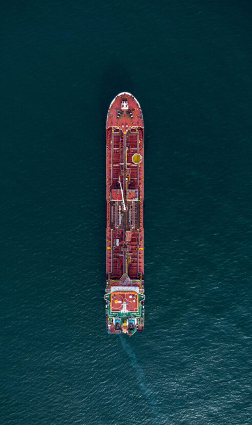 Large general cargo ship tanker bulk carrier, Top down aerial view.
